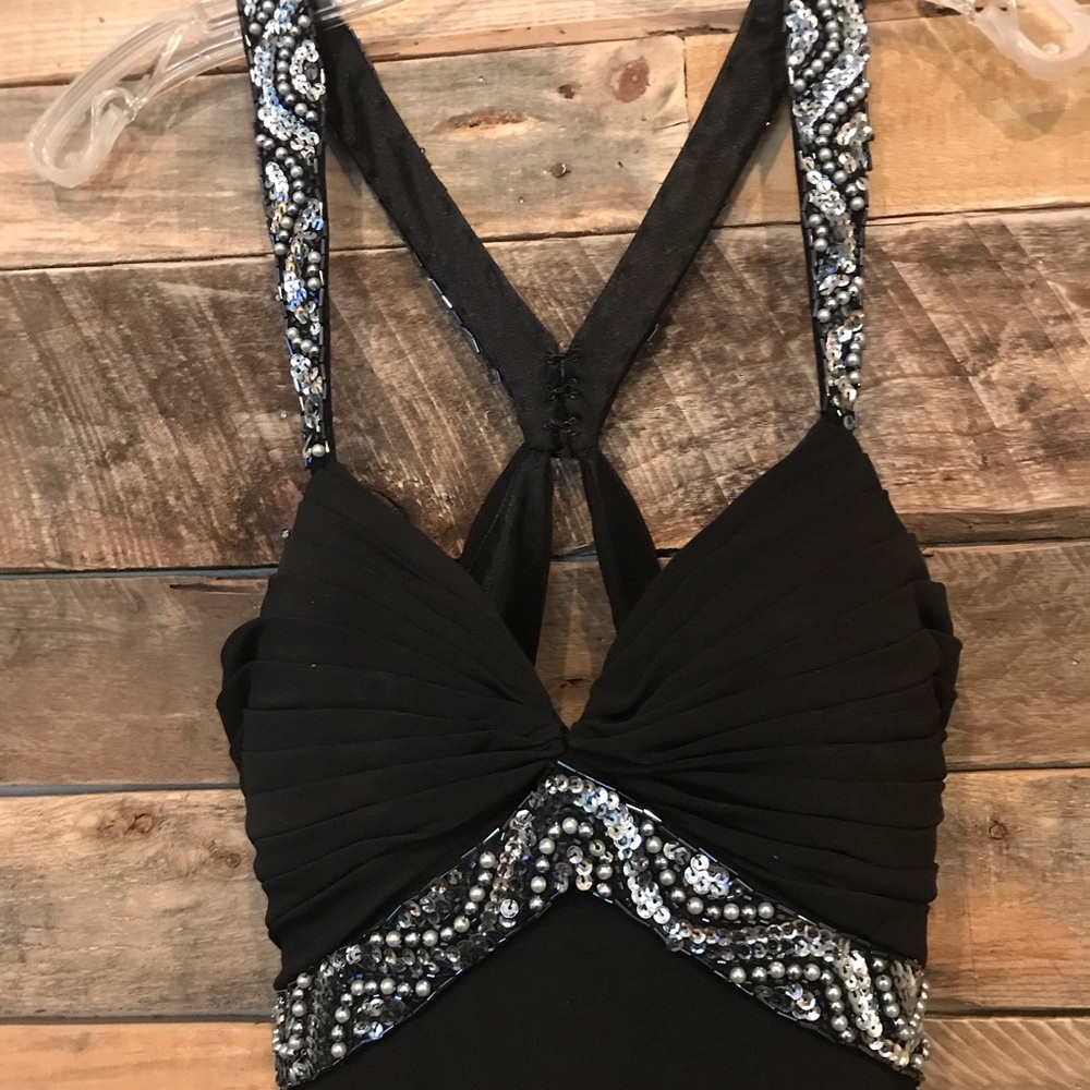 Black backless long formal dress sequin detail.